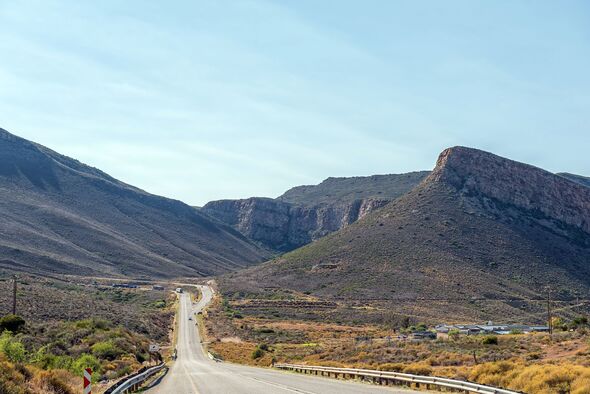 Trucks are visible on the Hex River Pass