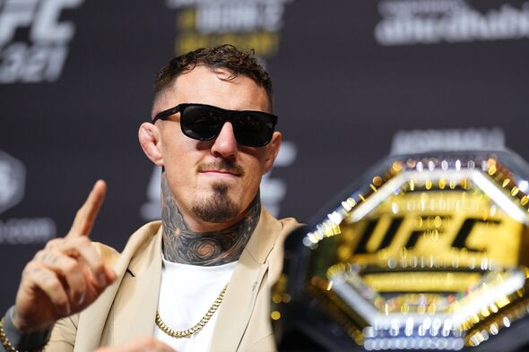 ABU DHABI, UNITED ARAB EMIRATES - OCTOBER 23: Tom Aspinall of England is seen on stage during the UFC 321 press conference at Et