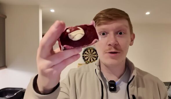 Ed Chapman with a red velvet cake