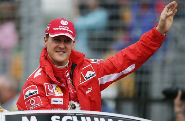 MELBOURNE, AUSTRALIA - MARCH 6: Michael Schumacher of Germany and Ferrari during the drivers parade prior to the Australian For