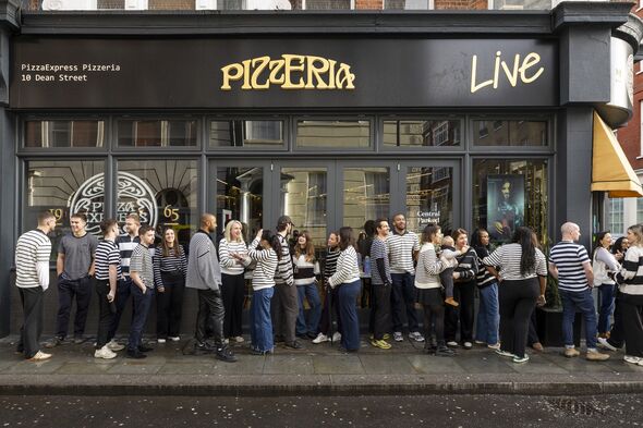 People queuing for a pizza