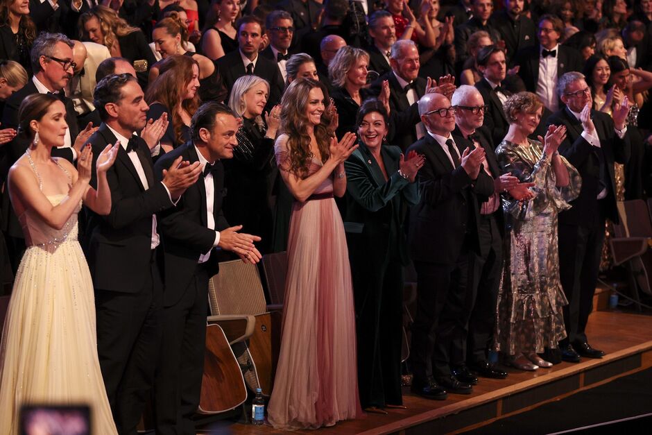 The Princess of Wales claps as her husband presents and award