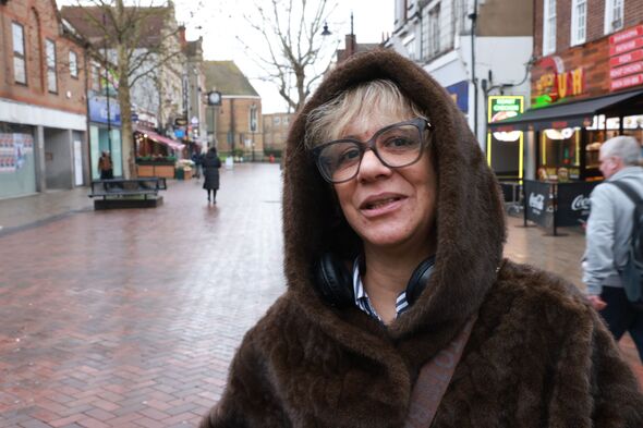 Charmaine wearing a fur coat