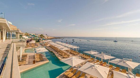 Picture of an expansive outdoor pool area