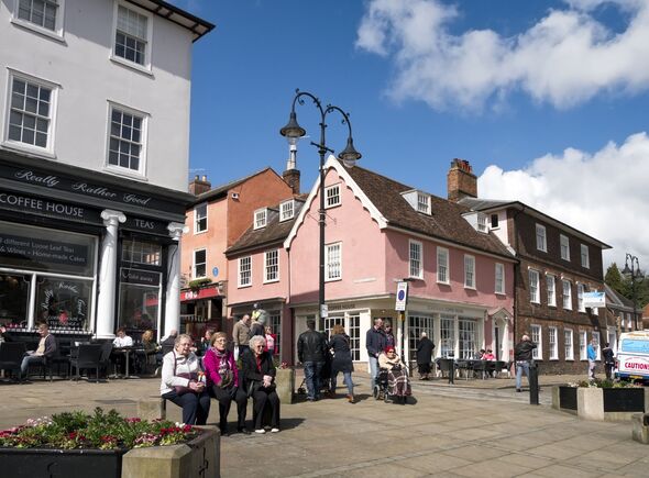 People enjoying the sun in Bury St Edmunds town centre