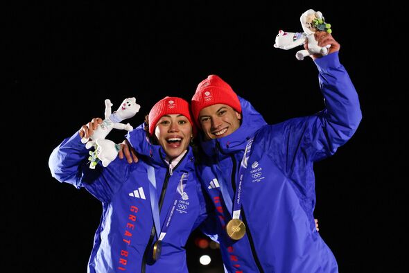 Tabby Stoecker and Matt Weston celebrate their win