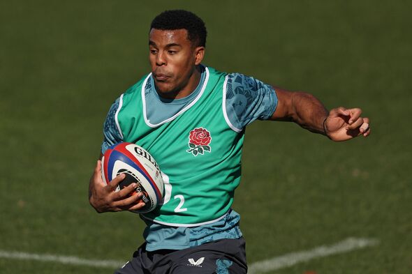 Immanuel Feyi-Waboso runs with the ball during the England training camp.