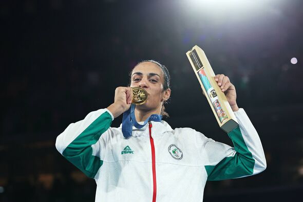 Gold Medallist Imane Khelif kisses her medal