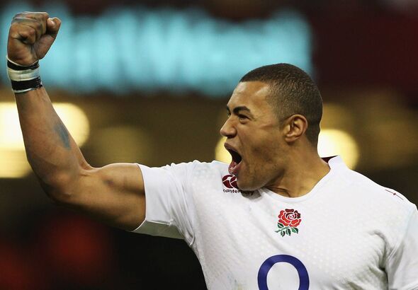 Luther Burrell of England celebrates victory