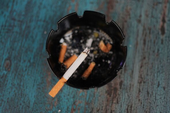 Cigarette in ashtray