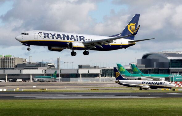 A Ryanair passenger plane lands at Dublin Airport