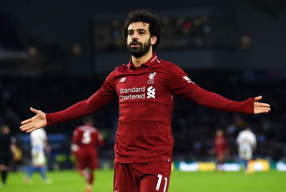 Liverpool legend Mohamed Salah celebrates