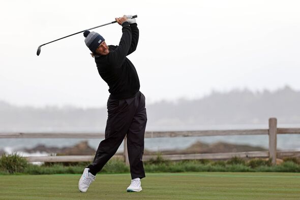 Tommy Fleetwood plays his shot at Pebble Beach