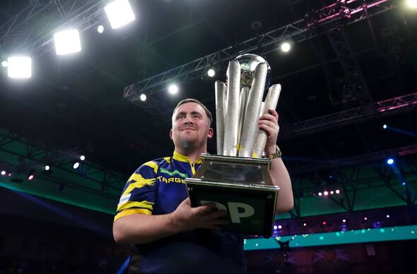 Luke Littler celebrates winning the 2026 PDC World Championship