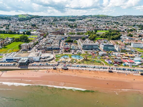 Paignton Seafront with funfair and beach