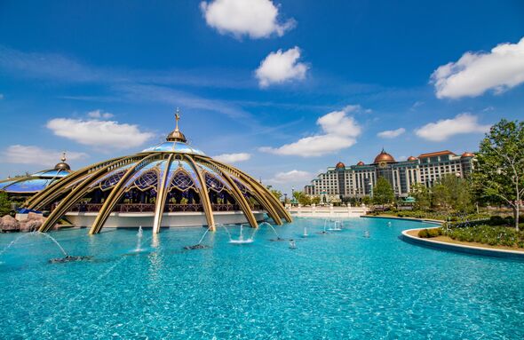 Guests enter Epic Universe through Celestial Park via the grand entrance gates or directly from the Helios Grand Hotel.