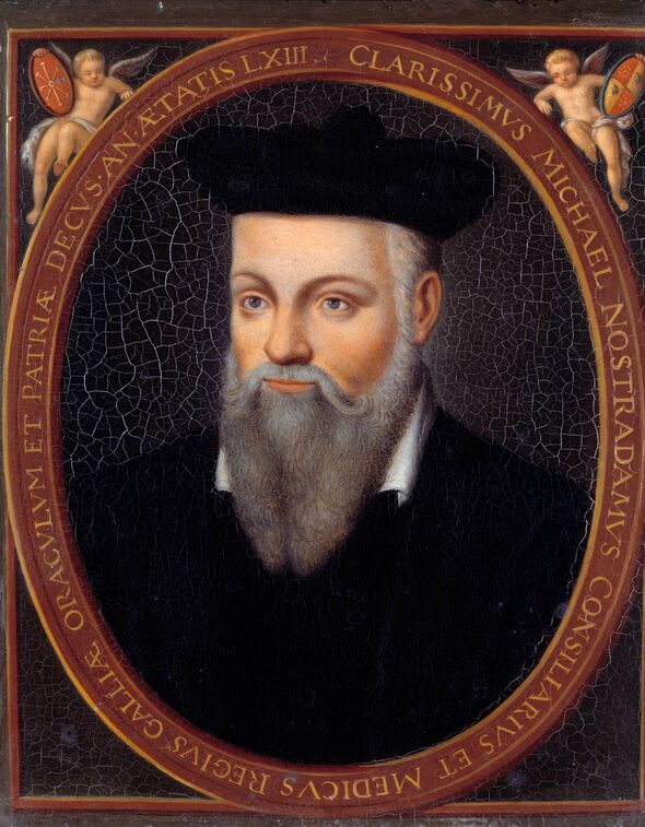 A formal portrait of an individual, depicting a man with a long, pointed beard and a scholarly demeanor. He is dressed in dark a