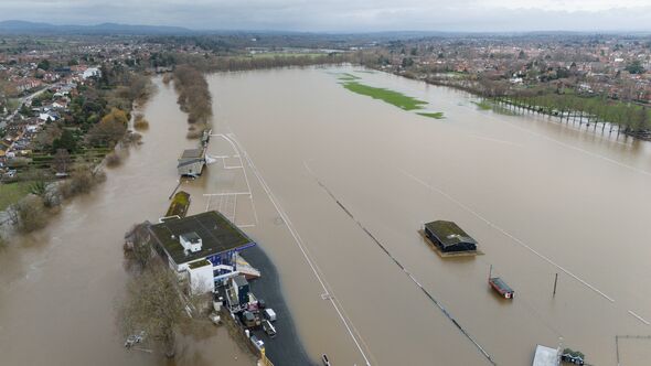 A flooded Worcester Racecourse following persistent rain. Parts of the UK look set to be soaked by downpours with a yellow warni