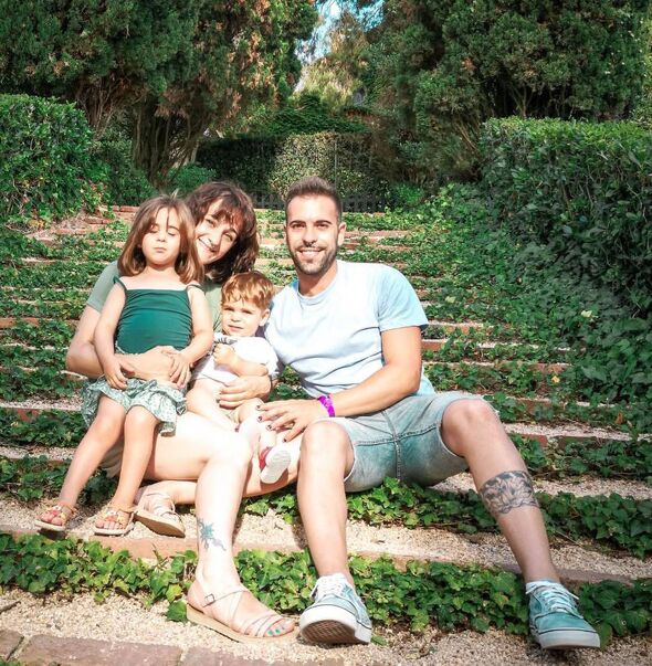Daniel and Ana Parra pose with their two children