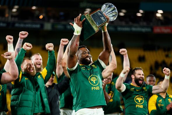 Siya Kolisi of South Africa celebrates with the Freedom Cup after winning The Rugby Championship match over New Zealand