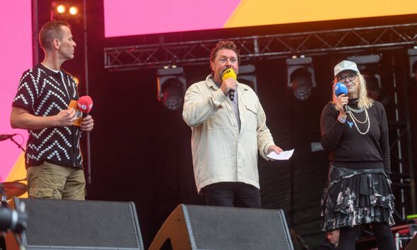 PRESTON, ENGLAND - SEPTEMBER 8: (EDITORIAL USE ONLY) Michael Ball, Scott Mills and Sally Boazman introduce Delta Goodrem to the