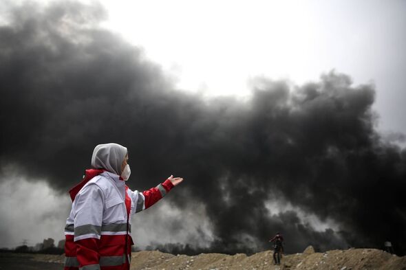 TEHRAN, IRAN - MARCH 8: Black smoke rises after fires broke out following US-Israel attacks targeting some oil storage facilitie
