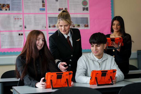 Students use their iPads in a classroom