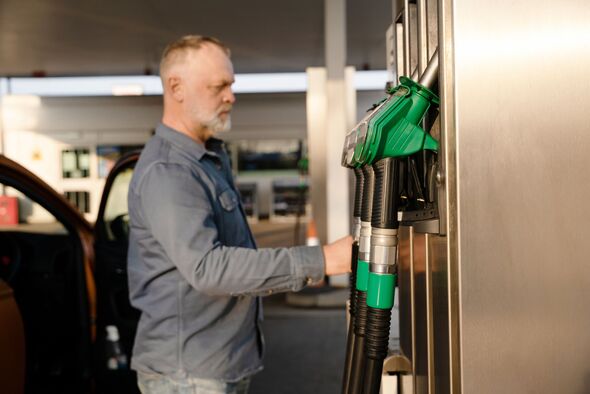 Fueling up car at modern gas station with diesel or petrol, capturing the essence of everyday travel and convenience