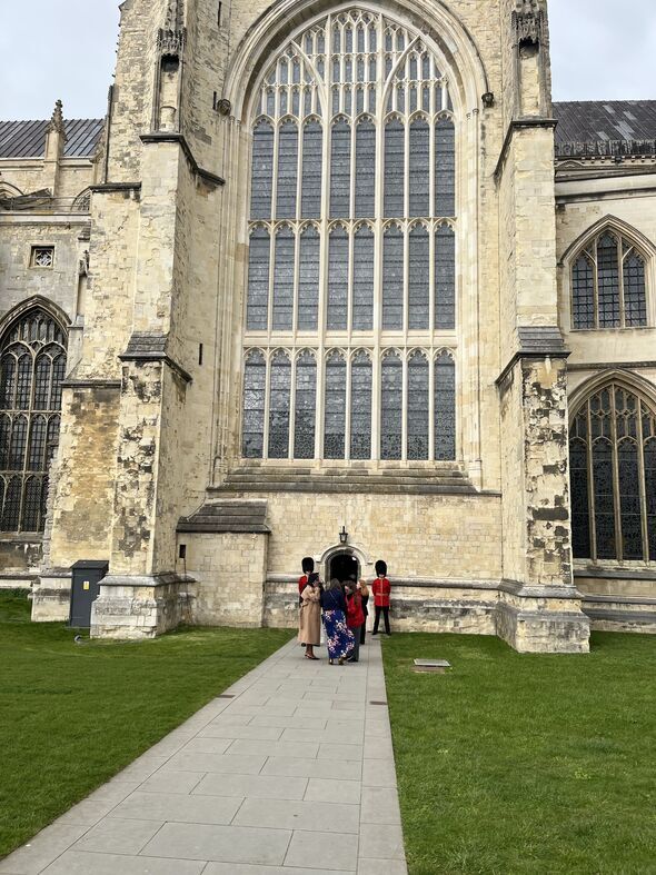 The Grenadier Guards stood by the entrance to the cathedral