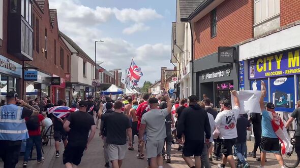 Anti-migrant protestors gather in Nuneaton chanting "Keir Starmer's a w*nker