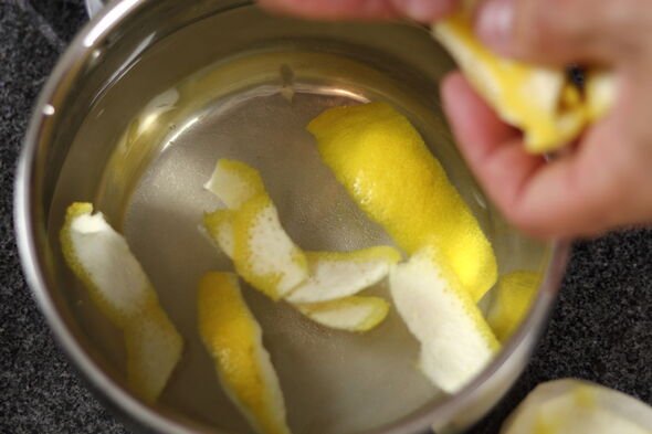 Add lemon skins into saucepan with water for