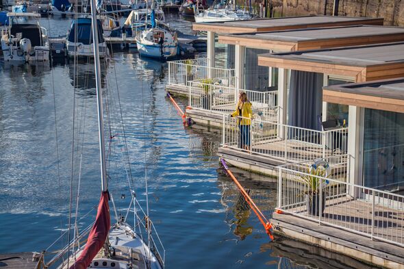 Book a unique coastal stay in four floating cabins among the boats moored at Milford Marina