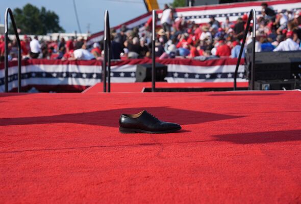A shoe is left on stage after the assassination attempt on Donald Trump's life in Pennsylvania