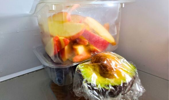 Picture of clingfilm avocado slice stored in the fridge.