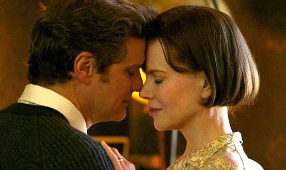An intimate moment between two individuals, characterized by their close proximity and engaged gazes, is depicted in the image.