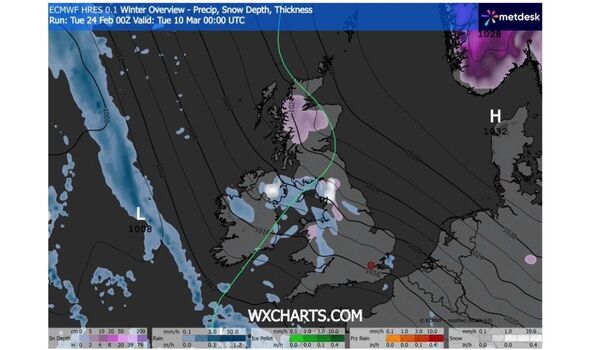 uk map with white and purple patches showing snow