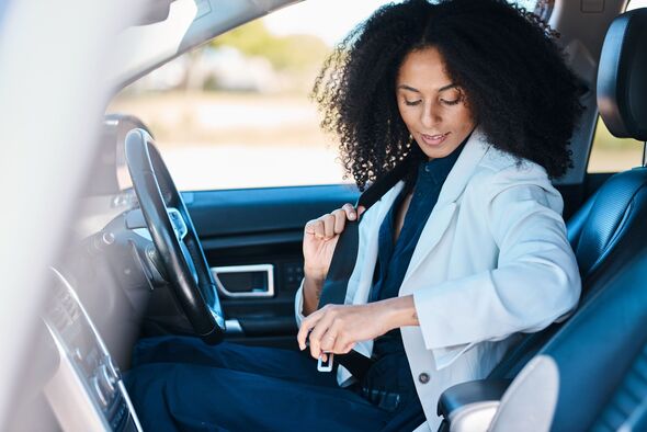 Professional Woman In Car Adjusting Seatbelt Inside Modern Vehicle For A Busy Day At Work