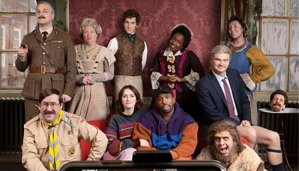 Cast of BBC Ghosts posing together for a publicity picture