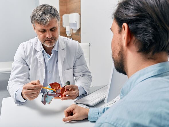 Doctor urologist consulting patient with prostatitis