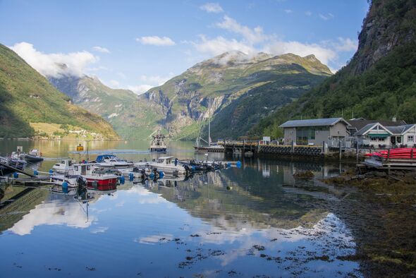 Geiranger fjord and harbor in Geiranger town, Norway