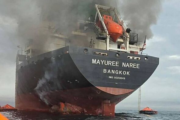 Smoke rises from the Thai bulk carrier 'Mayuree Naree' near the Strait of Hormuz after an attack