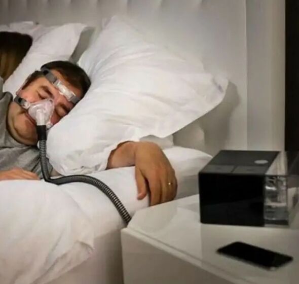 Patient wearing a CPAP (continuous positive airway pressure) device