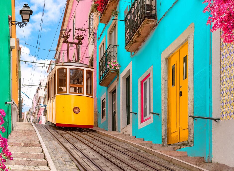 Yellow typical tram in Lisbon, Portugal