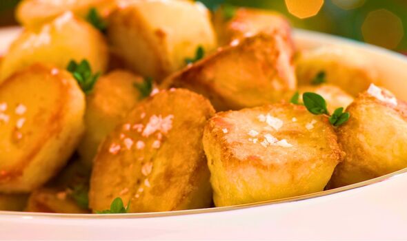 Picture of roast potatoes covered in salt