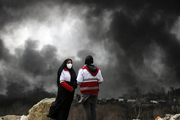 TEHRAN, IRAN - MARCH 8: Black smoke rises after fires broke out following US-Israel attacks targeting some oil storage facilitie