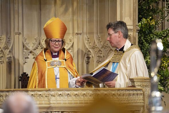 The Archdeacon of Canterbury 'seats' the new Archbishop in the throne
