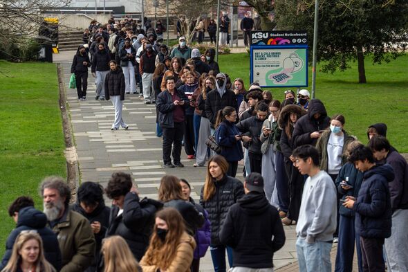 Students queueing for antibiotics