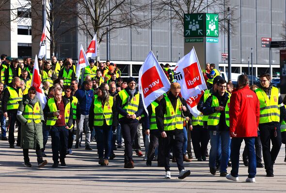 Verdi Union members protest in front of Berlin Brandenburg Airport