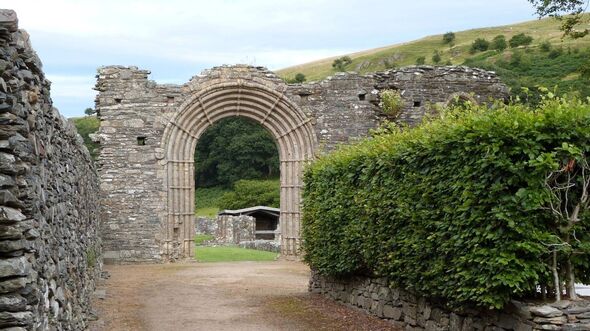 The abbey's richly decorated, round-headed west doorway
