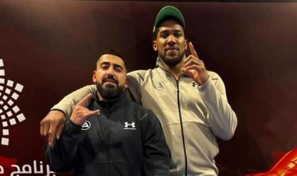 Sina Ghami with Anthony Joshua.